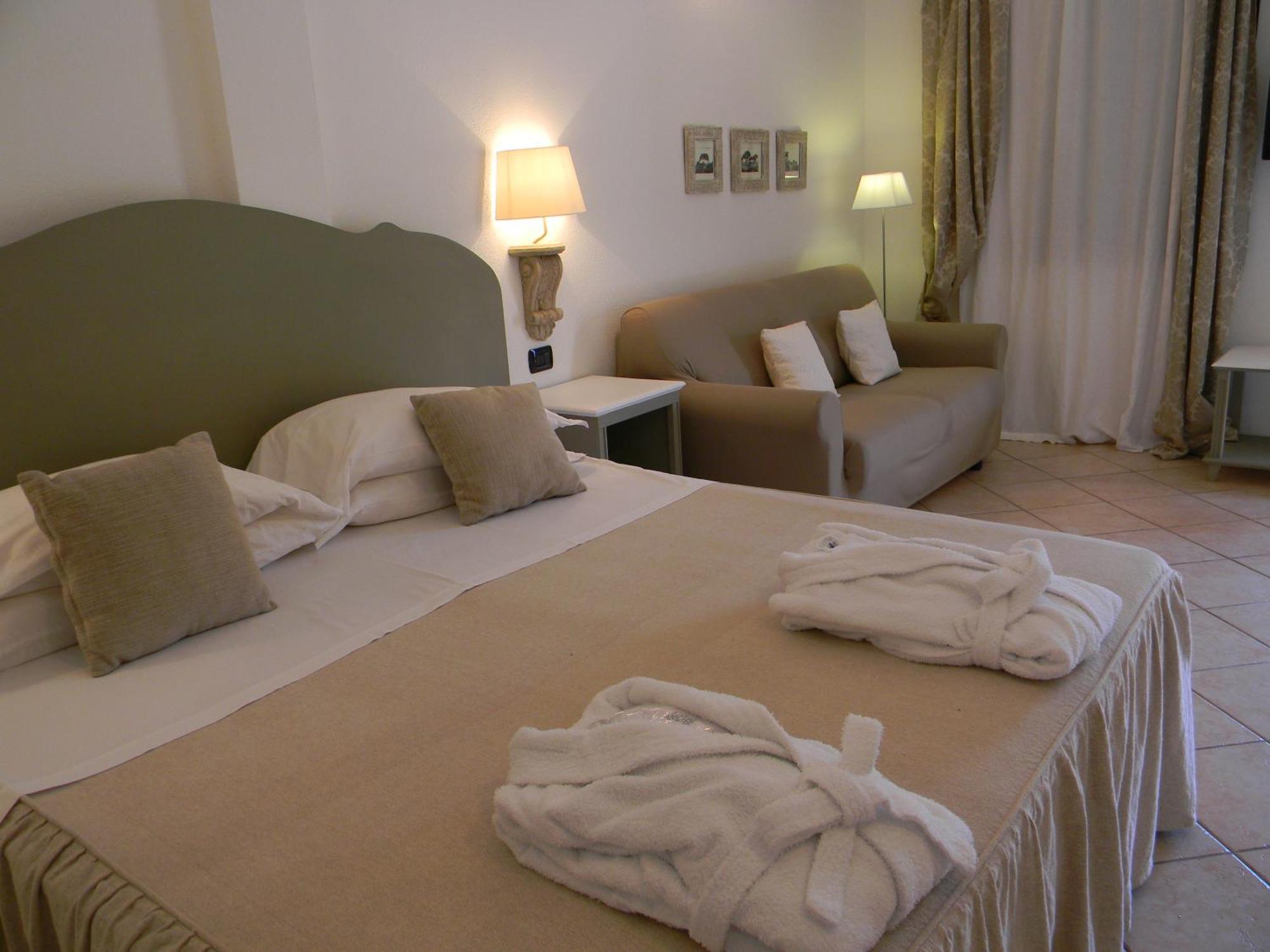 Relais Fenicottero Rosa Guest House Porto Taverna Cameră foto